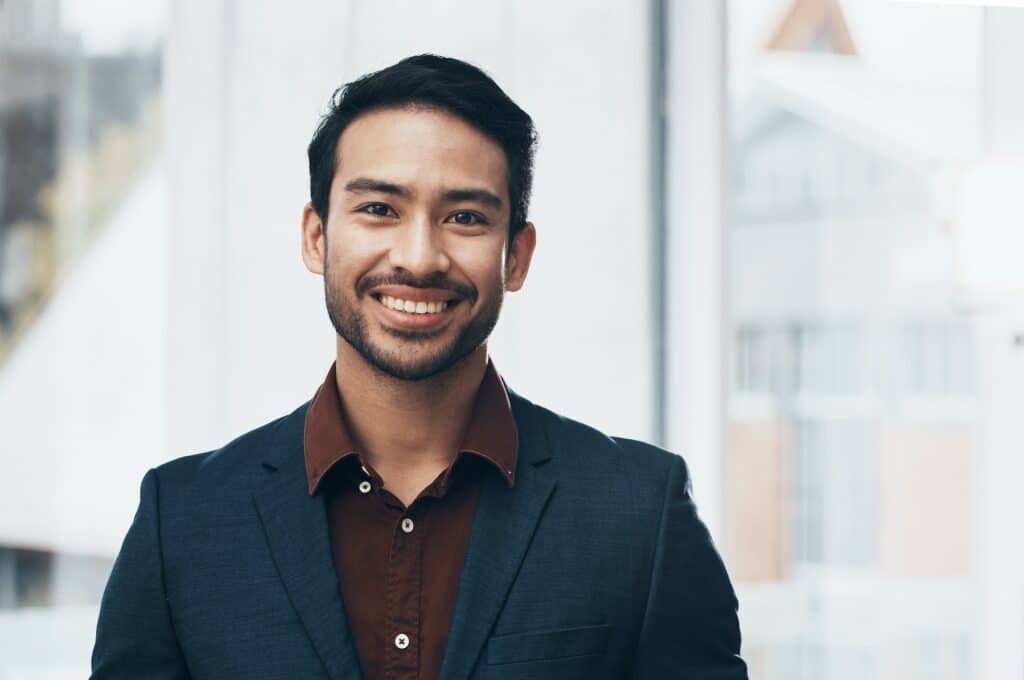 Office portrait, leader and happy business man, manager or CEO smile for startup company success. M